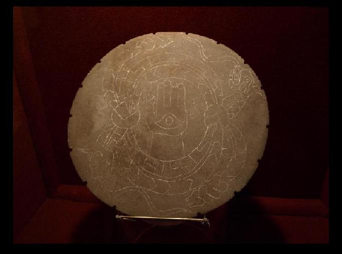 The Rattlesnake Disk.  It's thought that this stone Disk was used as a palette. The two knotted rattlesnakes appear with 