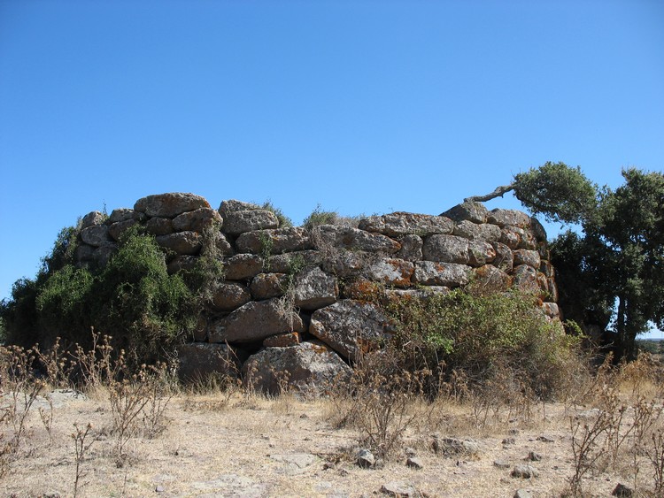 Massive walls of the Bronze Age nuraghe - view from the south (photo taken on September 2010).