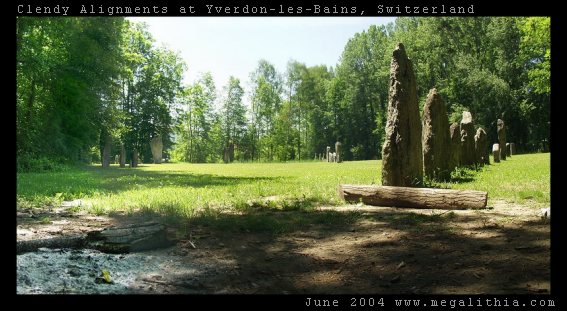 Alignment of standing stones at the southern end of Lac Neuchatel, Switzerland near Yverdon-Les_Bains. Two lines of standing stones intersect, roughly at the camera POV. As well as the straight lines, there is a semicircle of stones. For more details see http://www.megalithia.com/sites/4678n0666e.html