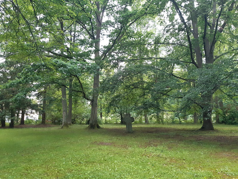 Massif medieval propitiatory stone cross in spa park of Konstantinovy Lázně.