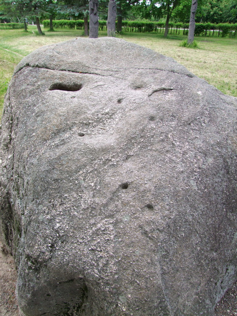 A few holes, most probably made to split the stone in pieces.  June 2015.

