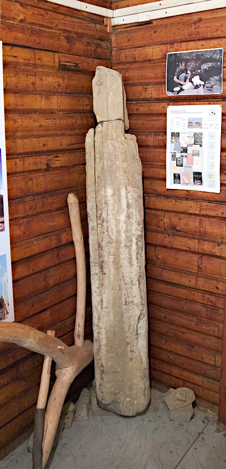 Standing stone, found near the walls of the fortification. Is described as a sacrificial stone in the exhibition.