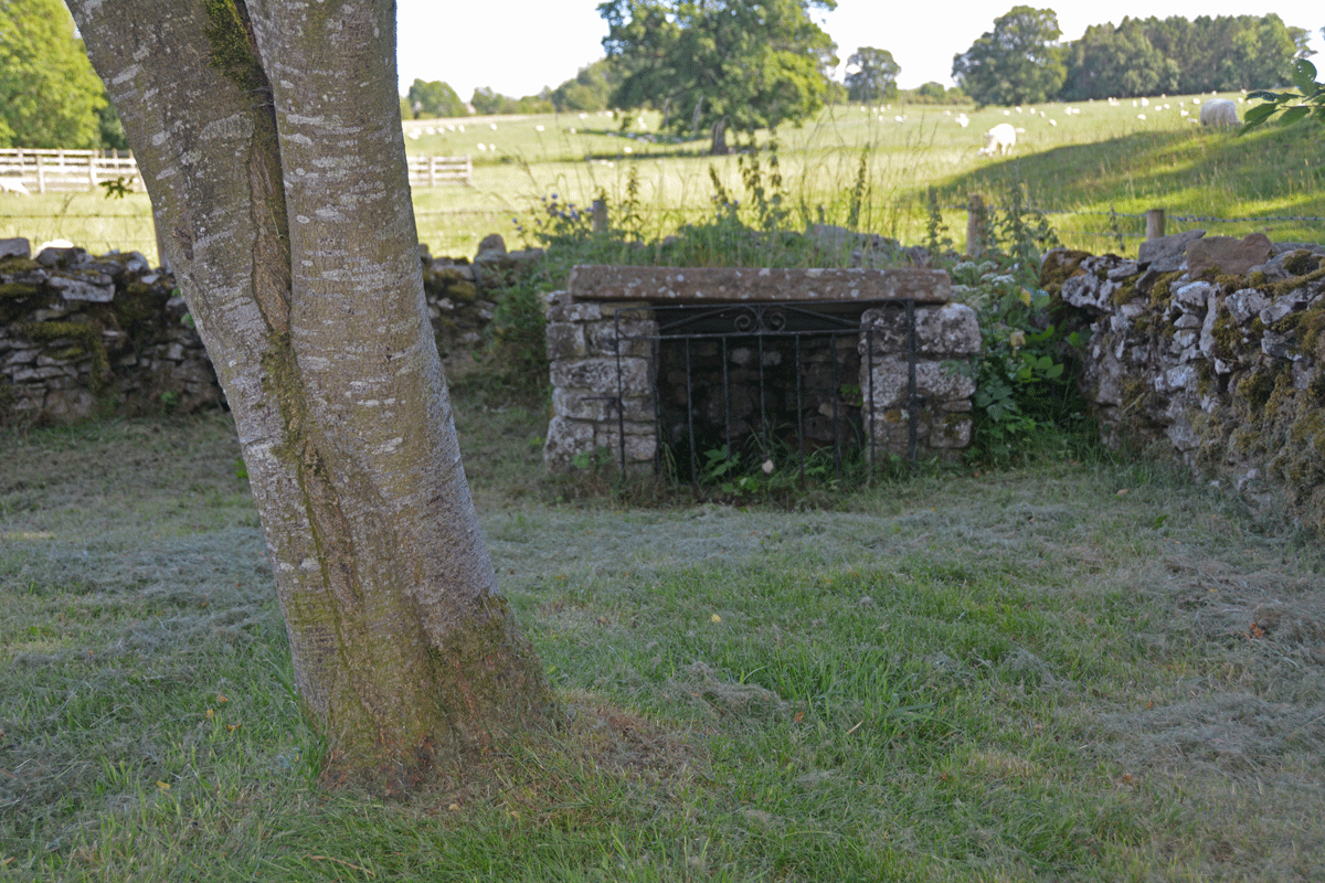 It is possible to park almost next to the well, which is set back from the road.  It sits in a small 'alcove' defined by dry stone walls, and below the churchyard.  Cumbria HER date the well to medieval, but is it older?