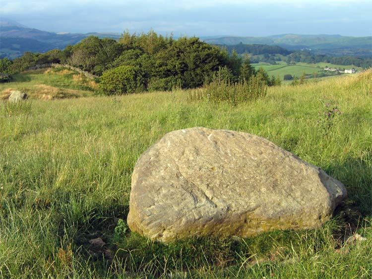 The parallel grooves on the lower part of the left hand side of the southern stone are clearly visible here.