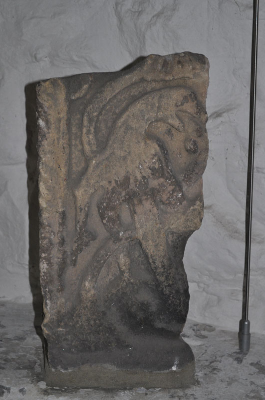 Fragment described in Corpus of Anglo-Saxon Stone Sculpture as 'Escomb 01 Fragment A'.  Located within the porch with a small collection of other cross shafts and grave covers.