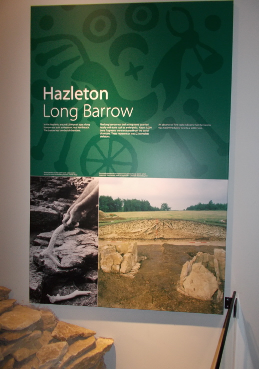 The first display in Cirencester Museum is this reconstructed chamber of Hazleton long barrow and its associated info.
I'm unsure which of the two it is, but the site page says this one was thoroughly excavated.
