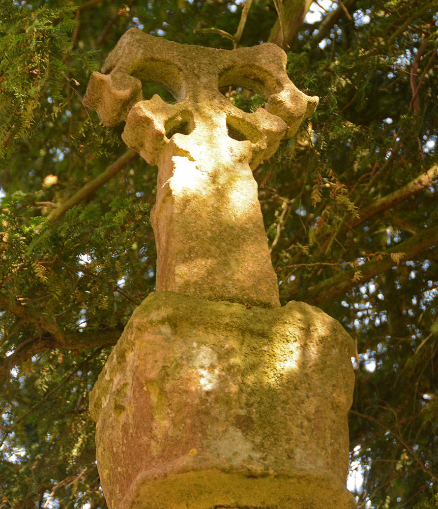 Site in Leicestershire and Rutland England.  The floriated cross head looks more modern than the worn capital underneath.