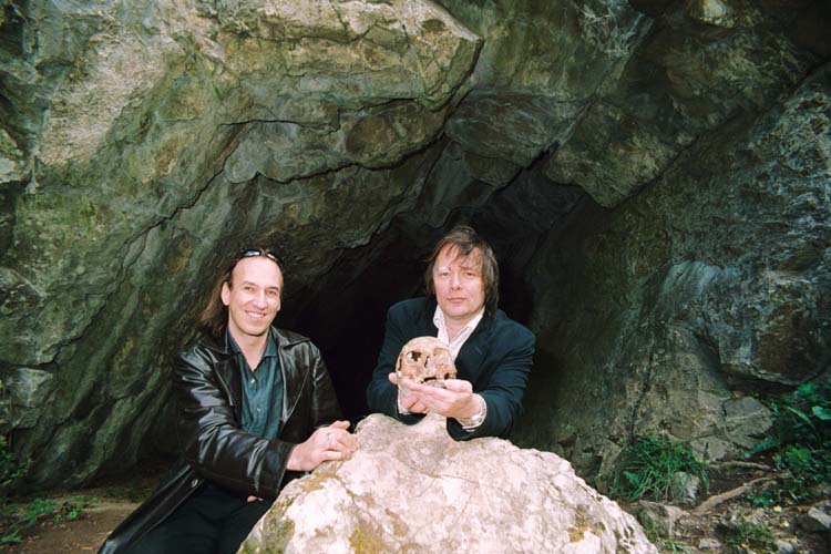 At more than 10,000 years old, Aveline's Hole in the Mendip Hills (Somerset) is Britain's earliest cemetery. Dr Rick Schulting of Queen's University, Belfast and Mick Wysocki of the University of Central Lancashire hold an example of the remains found at the site.