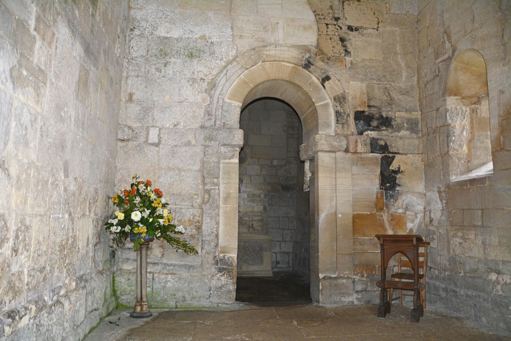 The western side of the chancel arch. The altar can just be seen at the bottom, left hand side of the arch. The angels are towards the top of this wall (out of shot).