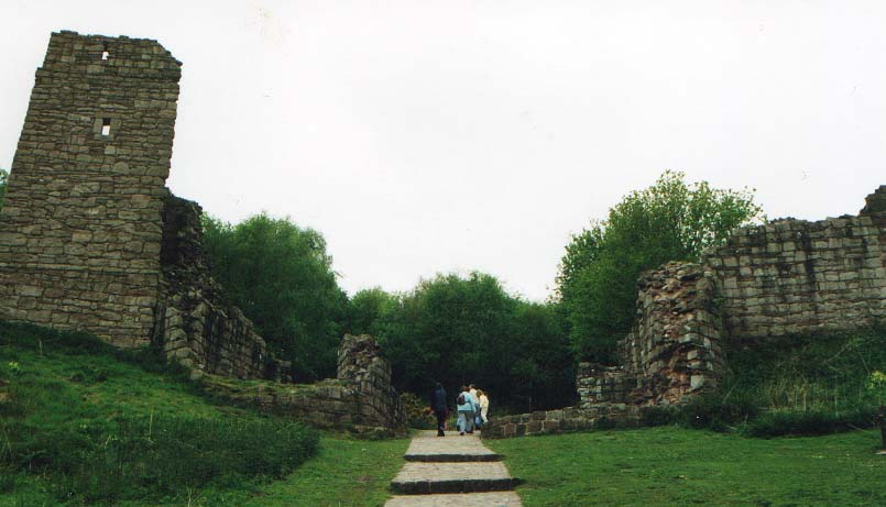 The entrance to Beeston Castle in Cheshire where a 13th Century Castle was built on top of an Iron Age hillfort (GR: SJ538592 ).  Excavations in 1978 revealed that the Medieval wall of this outer gateway was constructed on top of a prehistoric rampart with external ditch and counterscarp bank.

Prehistoric artefacts including bronze axes and implements, clay moulds and crucibles for casting bron