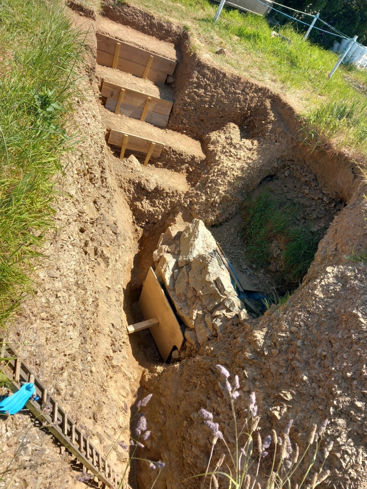 Took this from outside the enclosure - excavations exposing end of a Creep passage?