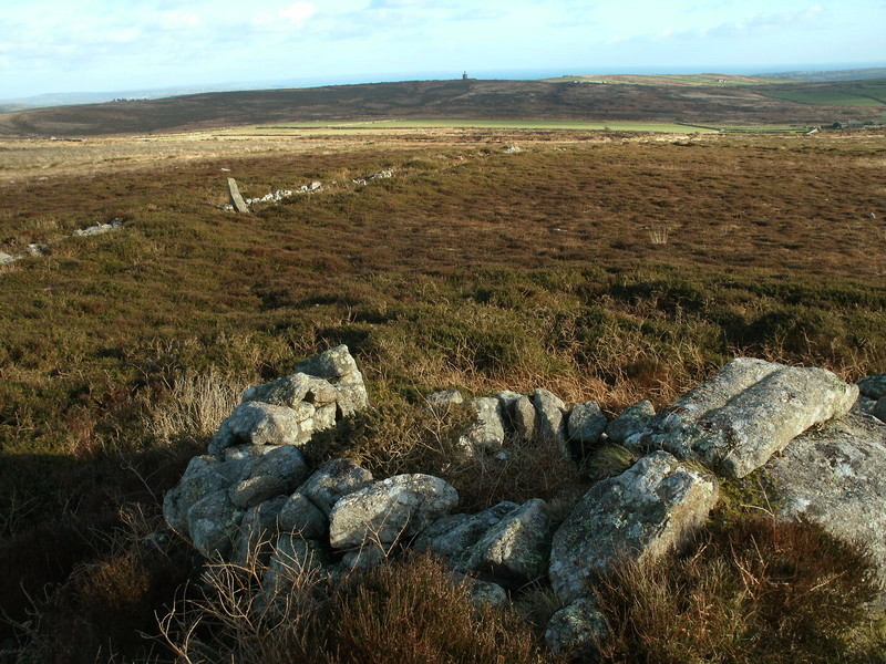 Watch Croft Cairns, this cairn (some of the stones have been turned into a horrible shelter) is built against an outcrop and is found at SW420357.  Notice the standing stone behind.