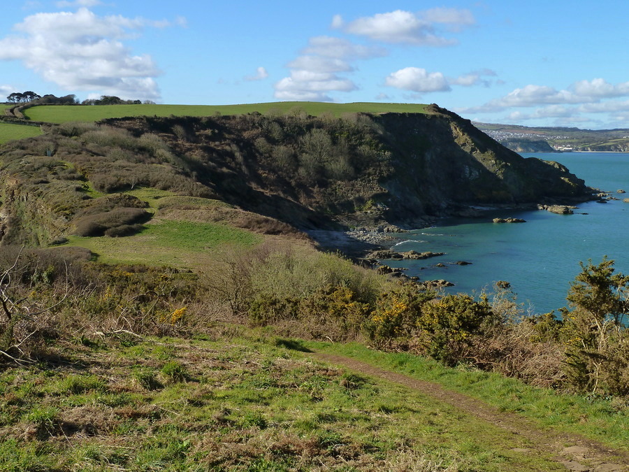 Black Head promontory fort - looking North and out over the narrow neck of land that leads to the fort (center left).