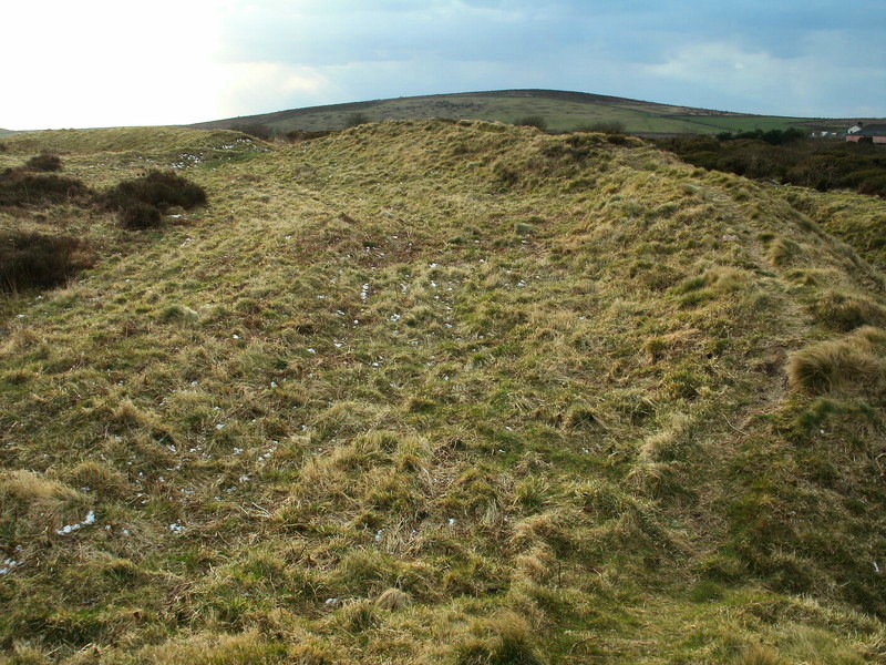 The bank of Caer Bran Hillfort with the sacred Bartine hill in the background.