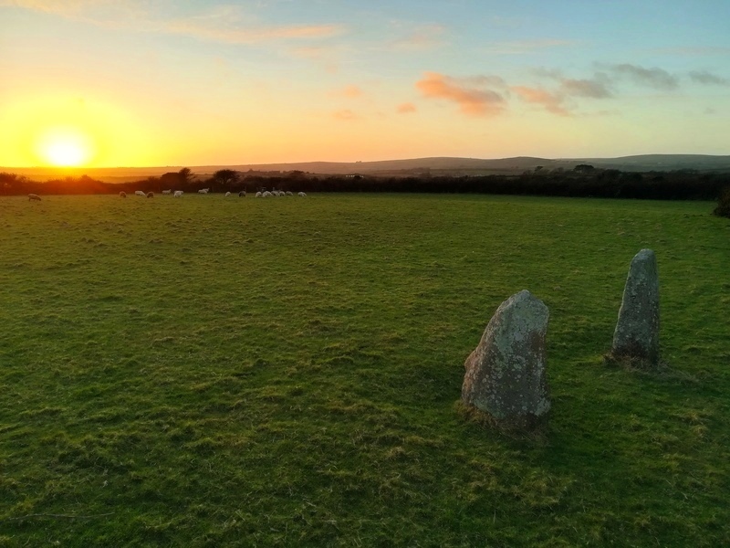 The Standing Stones within the settlement and the beautiful setting winter sun
