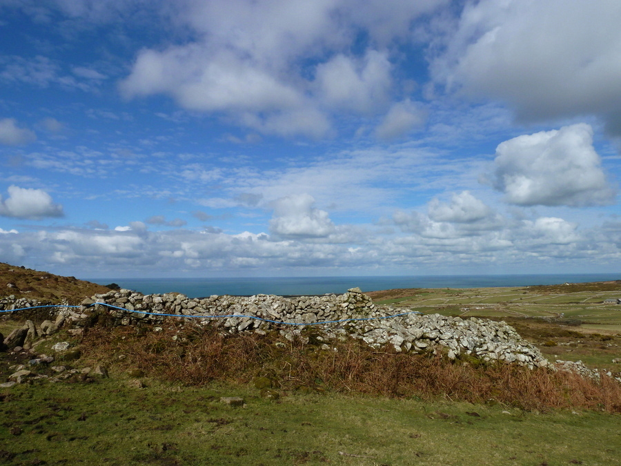 Carn Galver Cairn, A roofless stone building about 8.0m long and 4.0m wide has been constructed in the cairn, It was excavated circa 1840 and found to contain a burial urn.