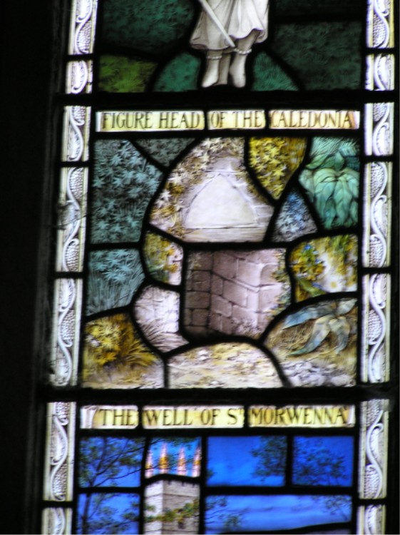 Window in St Morwenna & St John the Baptist's Church at Morwenstow, showing St Morwenna's Well.