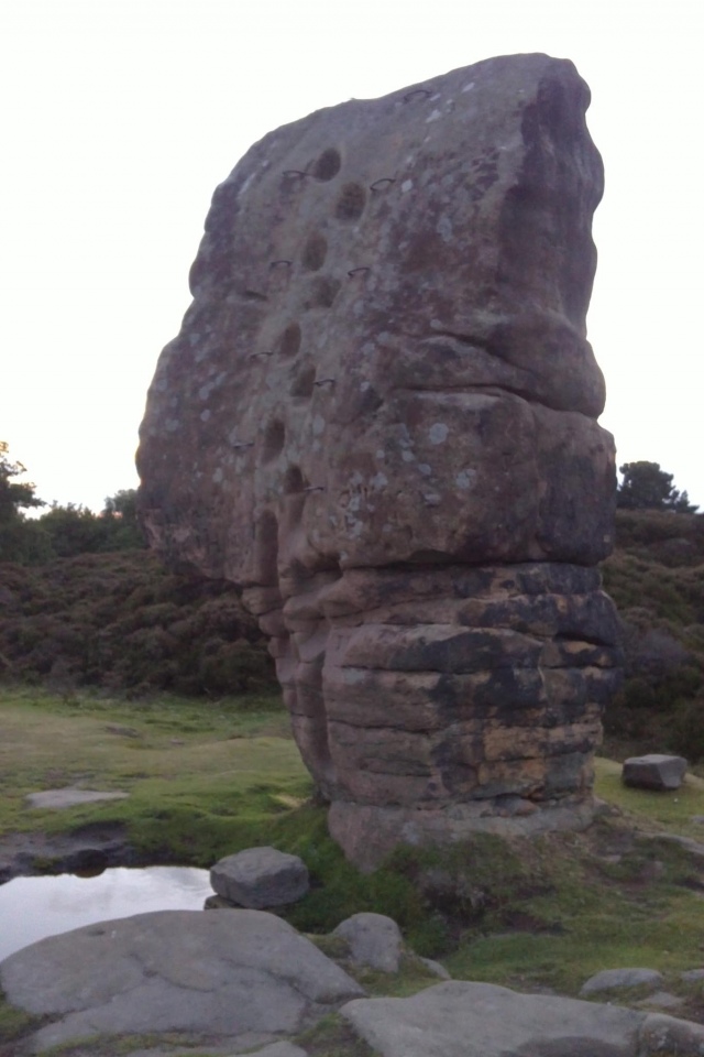 The 15ft high stone has footholds for climbing.
Photo taken in 2011