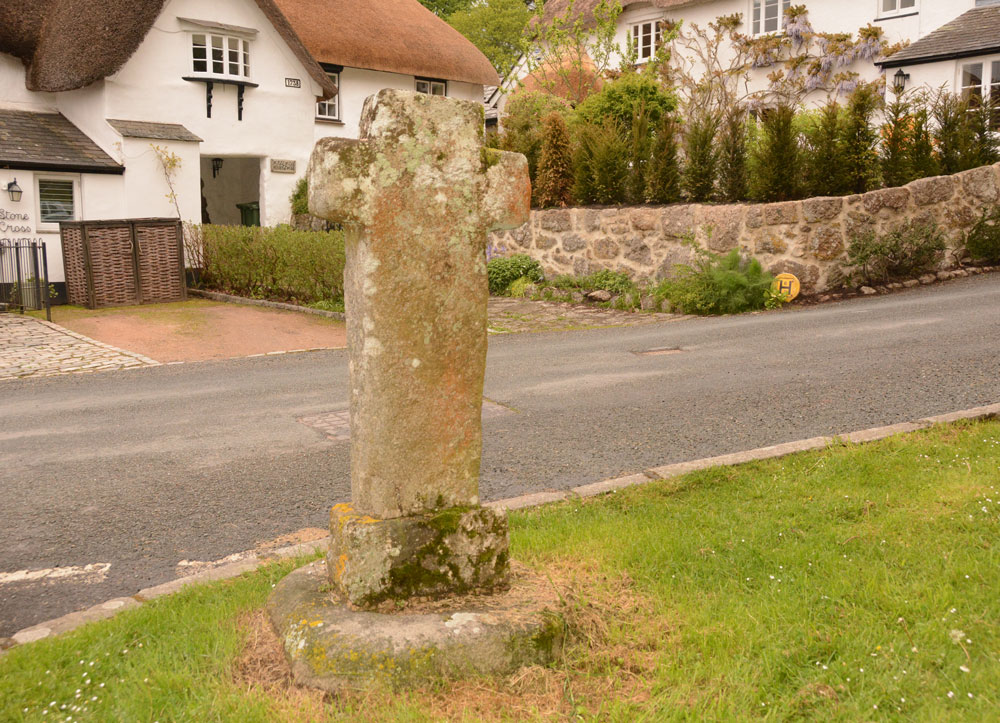 Standing just to the north east of the cross, on the green, looking across at Stone Cross Cottage and the other thatched cottages which abut the churchyard. I managed to get this photo, taken in the few minutes between one car left and another parked up, on 11th May, the day after our original visit.