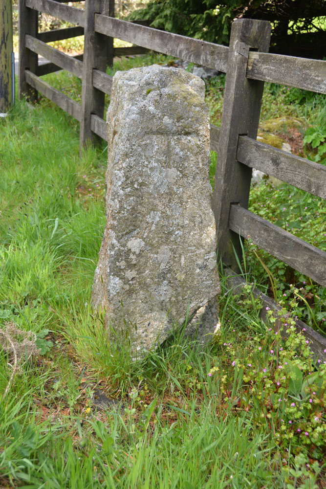 The southern side of this waymarker, with its incised T for Tavistock. Historic England calls this a rare survival.