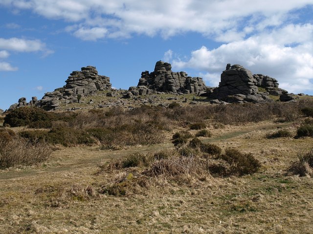 Hound Tor
From this angle, taken a little way into the moorland from Swallerton Gate, SX7479 : Hound Tor falls into three main stacks.

Copyright Derek Harper and licensed for reuse under the Creative Commons Licence.