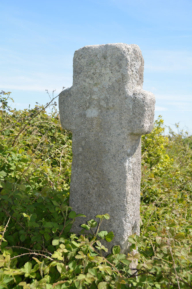 The western side of the cross. Just a small section of the incised cross on this face can be seen, underneath the covering of lichen.