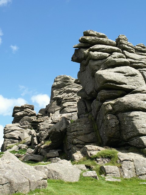 Hound Tor
The tor has plenty of attractive rock piles to explore. Even though the alignment of many of them trends NNW-SSE, as here, there is a clear avenue (a frequent feature of tors) between the two main parts of the tor which is aligned east-west. These dramatic rocks are on the southern side.

Copyright Derek Harper and licensed for reuse under the Creative Commons Licence.