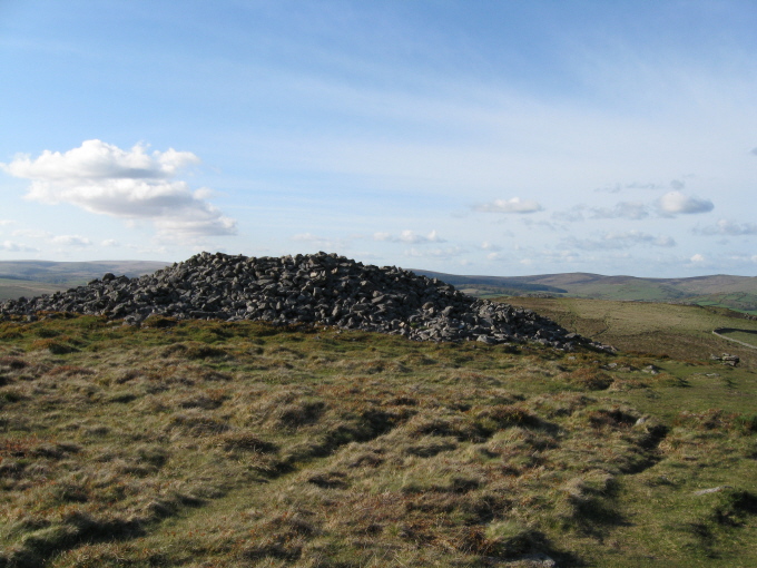Cairn A  (20 x 3m), 50 m to the north of the outcrop on the highest point of Corndon Down.