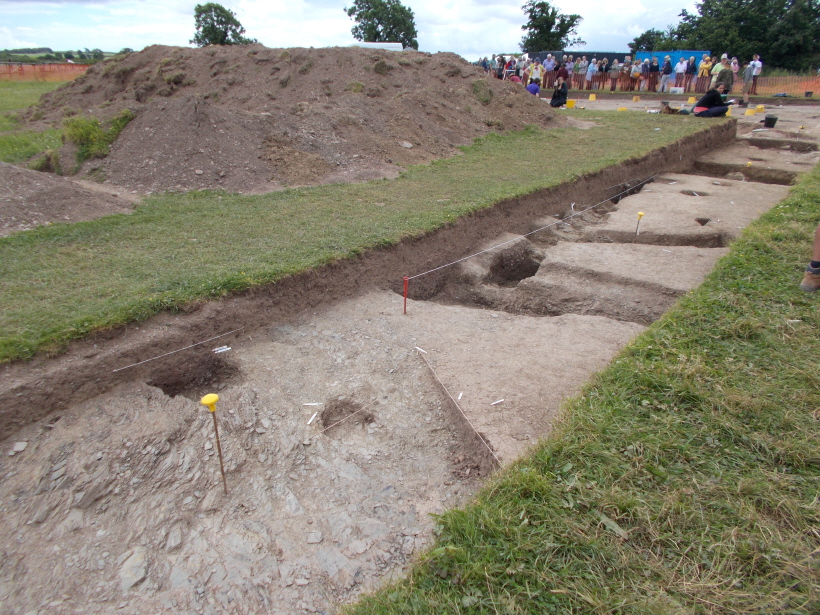 Looking east back towards the main area of the dig, from the western end of the W/E narrow trench. 