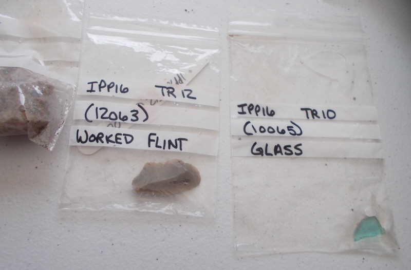 Worked flint and glass from this year's excavations.  Trenches 12 and 10.