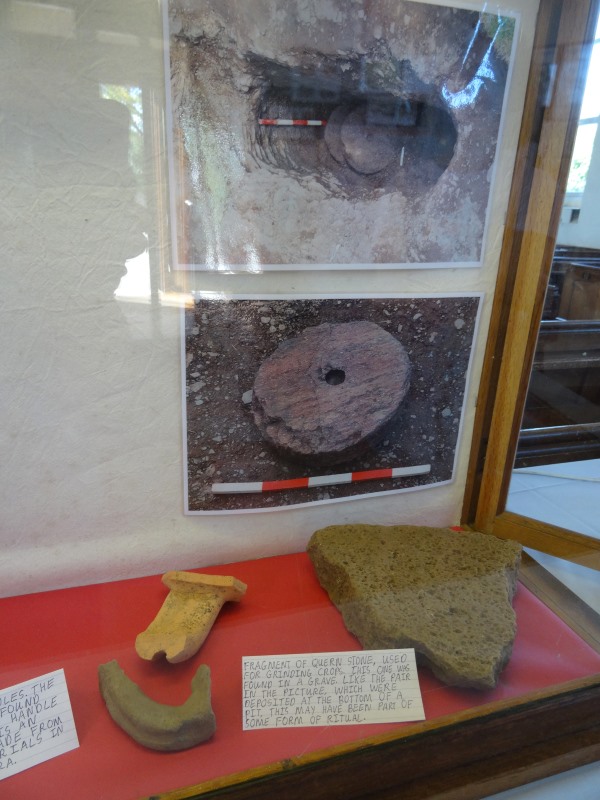 A quern stone and an amphora handle found at Ipplepen.