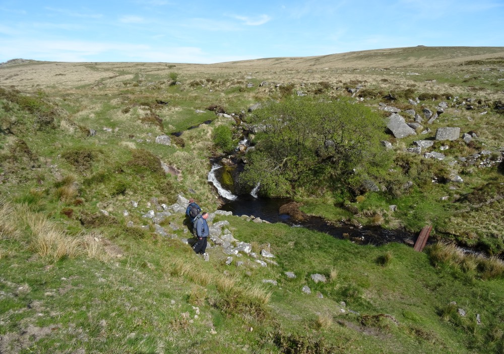 SandyG and Dave Parks inspect a ruin down by the river Meavy.  On the way to Hart Tor stone rows, 14th May.
