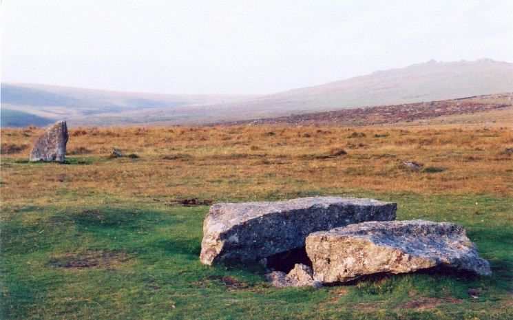 Another view of the large cist south of the southerly row at Merrivale.  This time another of the large stones along the southerly row is visible rear left.  These larger stones occur at intervals along the rows.
In the distance is Great Mis Tor to NE.
