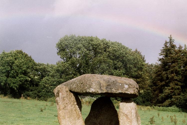 Spinsters' Rock with a rainbow