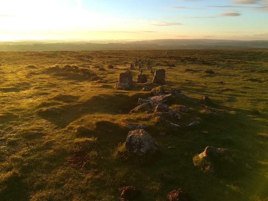 A June Sunrise at Cosdon Hill Cairn Circle and Cist, With it's associated Stone Rows disappearing to the East behind it