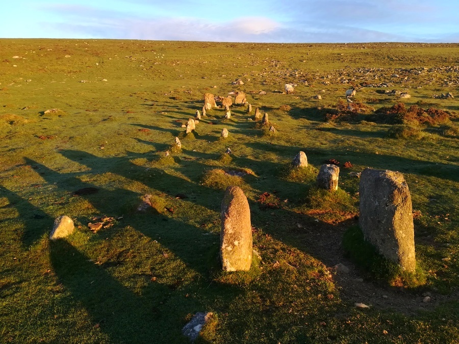 June sunrise light shining onto the Cosdon Hill Multiple Stone Rows, Looking West

