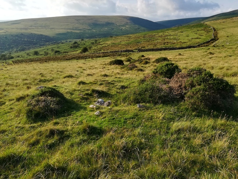 The Cairn a little lower down the hill and to the North West of the Cairn Circle and Cist.
