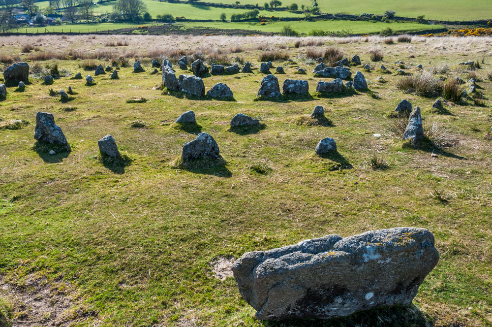 This is not the easiest of stone circles to photograph. Ideally you would get a better shot from a stepladder if you could carry one there. I have photographed this site from different angles on different days, and hard to decide which is the best viewpoint to get all four circles in the shot. For this shot I am standing at the edge of the outer circle.
I will post a couple of my other shots, whe