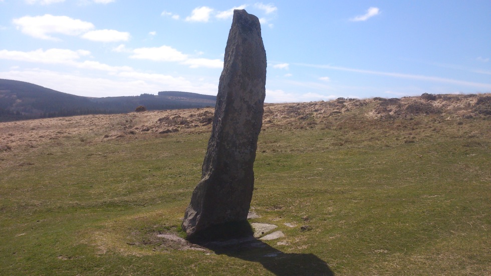 Great Standing stone at Shovel Down with Graywethers forest in the back ground.