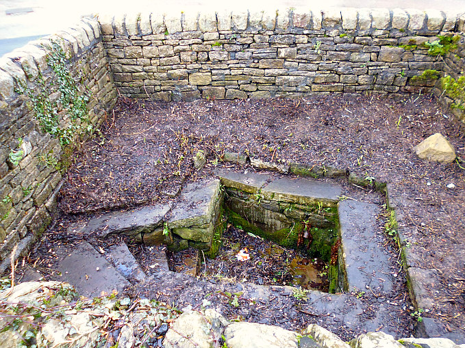 Jinny Well at Salterforth in Lancashire. It is supposedly named after Jenny Greenteeth, a water spirit who was guardian of the well, according to the legend.
