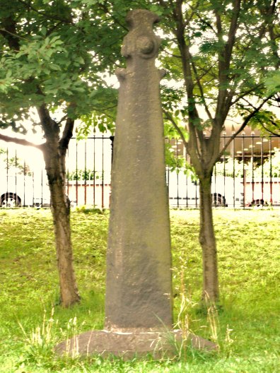 A close-up view of The Burnley Cross. If you look closely some traces of carving can be seen, especially the lower part of the shaft.