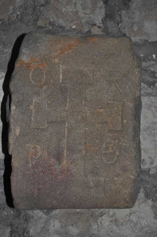 Close up of the Iona Cross (Corpus of Anglo Saxon Stone Sculpture reference Birtley 02) located in the north wall of the Sanctuary.  Dated AD700, the inscription of O E P E translates as Orate Pro Edmundo – Pray for Edward.