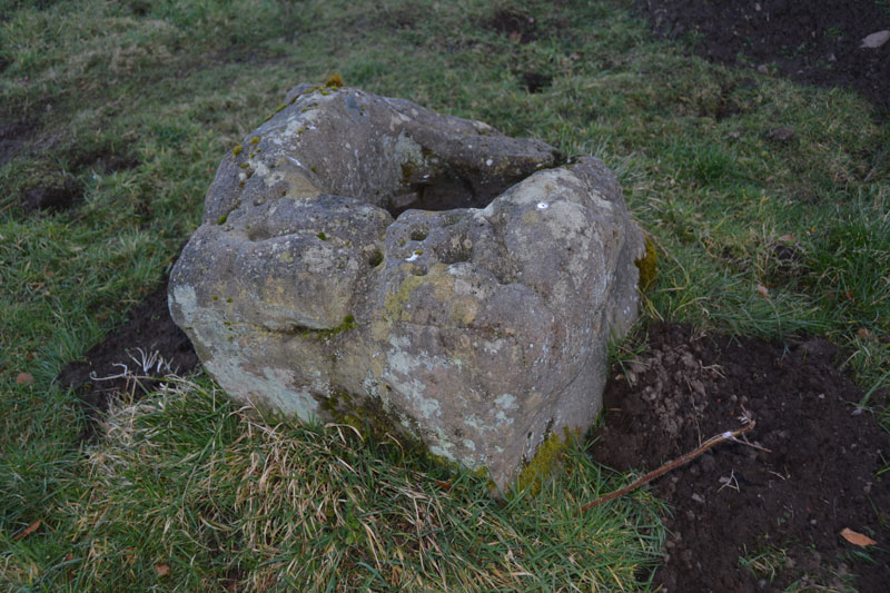 Close up of the Biddle Stone cut to hold a cross shaft.  Note the five holes (or sinkings), described in Pastscape Monument 1408 as 