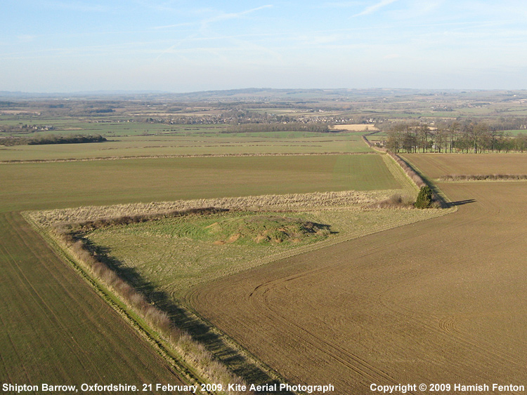 Shipton Barrow from the air looking north into the Evenlode Valley, Shipton-Under-Wychwood is hidden by trees and also going out of shot to the extreme right of the photograph.

Kite Aerial Photograph

21 February 2009