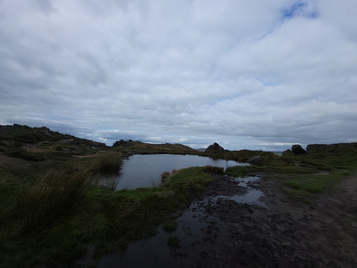 Doxey Pool on top of the Roaches ridge. Local legend says that Doxey was the inhabitant of Rock Cottage (hewn in to the rocks at the bottom) and after being assaulted by soldiers, she was thrown in to the pool where she now resides as a malicious water spirit. 