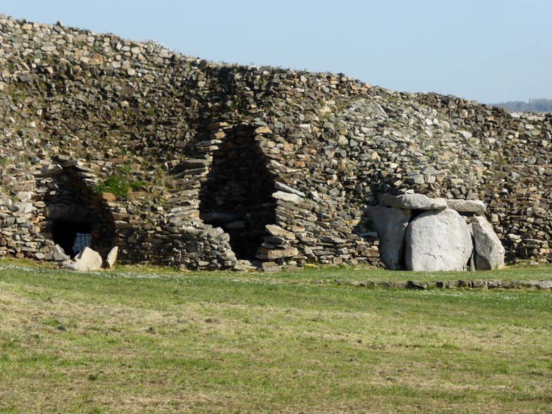 The quarried region of the huge Barnenez Cairn which first gave away its presence. Seen here from outside the encosed off area of the Cairn, from near to Cairn 2.