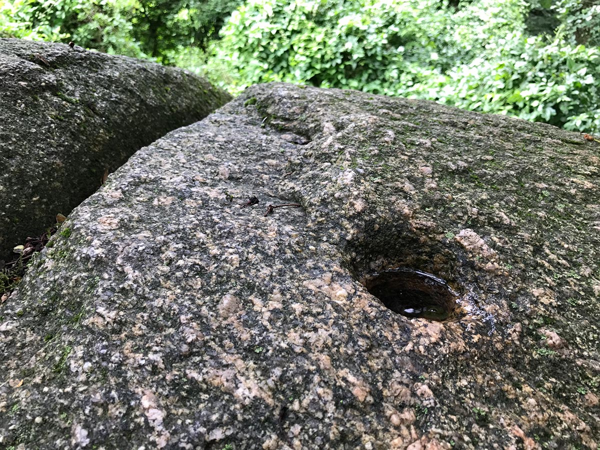 the Grosser Stein (large stone) with a deep furrow and a cup mark on its backside.