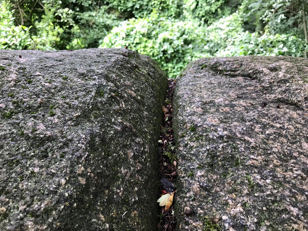 the Grosser Stein (large stone) with a deep furrow and a cup mark on its backside.