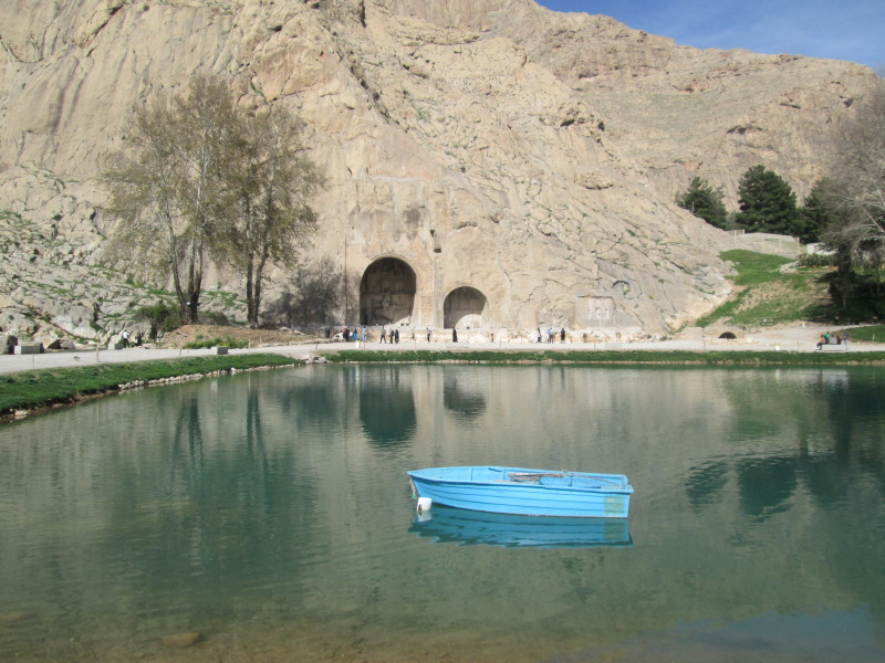 View across the lake at the park in which the two arches and relief carving are located at the northern end of Kermanshah city. April 2014.

