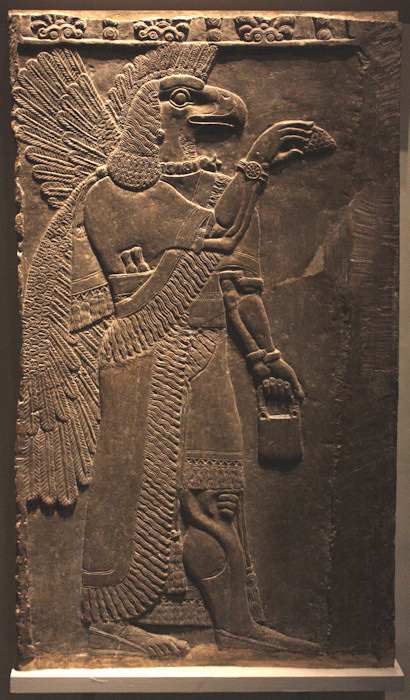 An eagle-headed protective spirit relief from the north-west palace of Ashurnasirpal II (reigned 883-859 BCE).